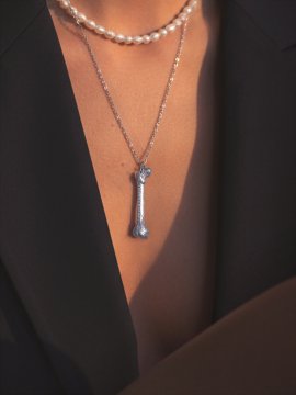 COLLAR PLATA "TUS HUESOS"
